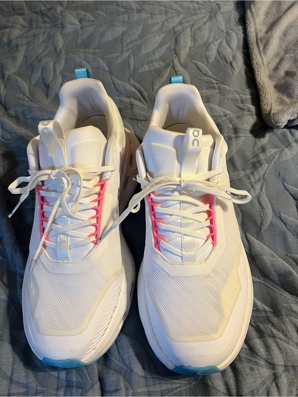On Clouds Women's White Sneakers with Pink Lace Accents and Blue Heel Tabs